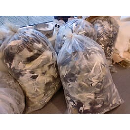 Saueskinnskapp i sekk, kvit